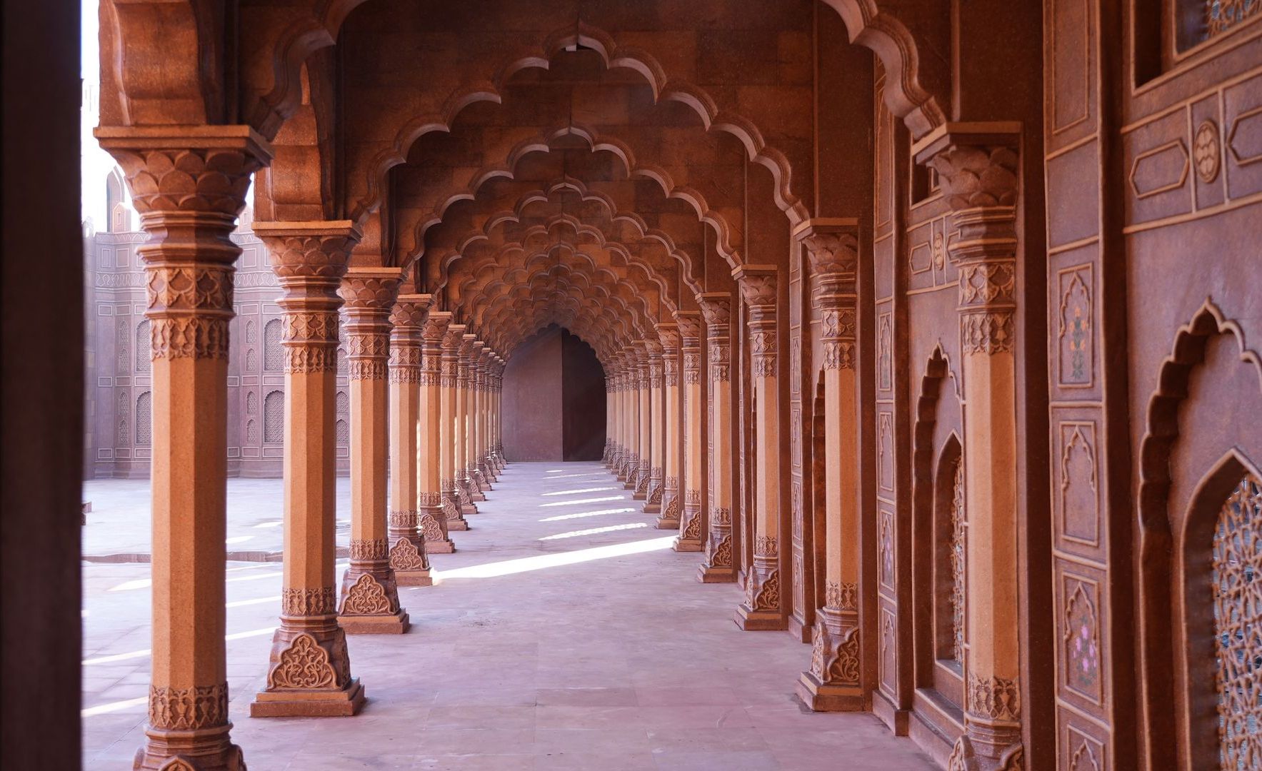 Sandstone arched corridor at Contiloe Studio